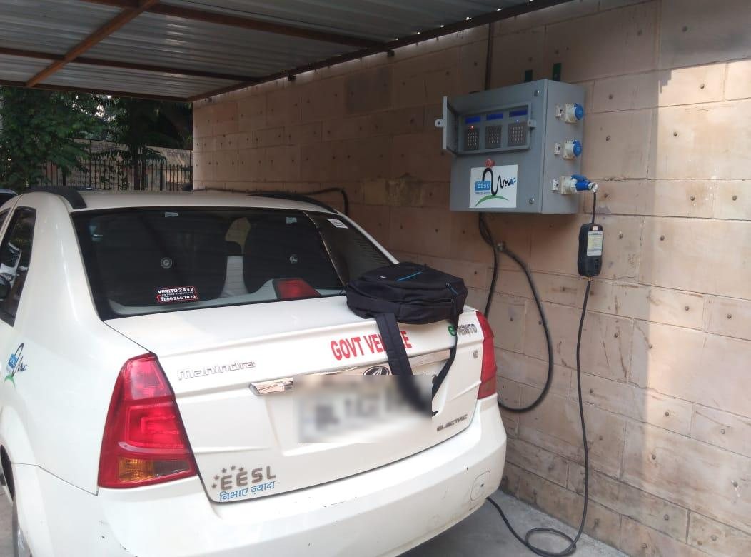 A three-socket EVIT charger in covered government parking, 2017